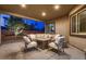 Inviting outdoor patio area with cozy seating, perfect for relaxing and enjoying the fresh air at 7418 Lawrence Powers Ct, Las Vegas, NV 89129
