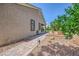 Beautifully landscaped side yard with a well-maintained walkway and healthy, mature landscaping at 7418 Lawrence Powers Ct, Las Vegas, NV 89129