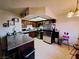Well-lit kitchen with stainless steel appliances and laminate wood flooring at 809 Rock Springs Dr # 202, Las Vegas, NV 89128