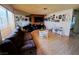 Cozy living room featuring hardwood floors and natural light from a large window at 809 Rock Springs Dr # 202, Las Vegas, NV 89128