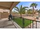 Backyard features a built-in grill, palm trees, and a partial patio area at 8208 Fritzen Ave, Las Vegas, NV 89131
