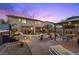 Cozy backyard featuring a patio, gazebo, firepit, hot tub and lounge seating at 8208 Fritzen Ave, Las Vegas, NV 89131