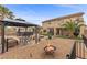 Backyard features a fire pit, gazebo, hot tub, and comfortable seating area at 8208 Fritzen Ave, Las Vegas, NV 89131
