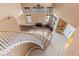 Elegant foyer with a curved staircase, large windows, and neutral decor at 8208 Fritzen Ave, Las Vegas, NV 89131