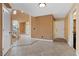 Spacious hallway with tile floors and neutral walls, offering seamless transition between rooms at 8208 Fritzen Ave, Las Vegas, NV 89131