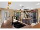 Bright kitchen featuring modern appliances, a kitchen island, and plenty of counter space at 8208 Fritzen Ave, Las Vegas, NV 89131