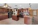 Well-equipped kitchen featuring granite countertops, custom cabinets, and stainless steel appliances for culinary enthusiasts at 8208 Fritzen Ave, Las Vegas, NV 89131