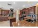 Well-equipped kitchen featuring granite countertops, modern appliances, and ample cabinet space at 8208 Fritzen Ave, Las Vegas, NV 89131