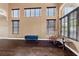 Bright living room with hardwood floors, large windows, and ample natural light for comfortable living at 8208 Fritzen Ave, Las Vegas, NV 89131