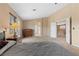 Spacious main bedroom with lots of light from the window, closet space, and carpet flooring at 8208 Fritzen Ave, Las Vegas, NV 89131