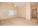 Spacious bedroom with carpet floors and soft, neutral walls, perfect for relaxation at 8842 Duncan Barrel Ave # 101, Las Vegas, NV 89178
