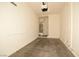 Attached garage showing utility fixtures and concrete floor offering storage at 8842 Duncan Barrel Ave # 101, Las Vegas, NV 89178
