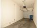Attached garage with an automatic door opener and space for storage or parking a vehicle at 8842 Duncan Barrel Ave # 101, Las Vegas, NV 89178