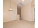 Bright living room with neutral walls, carpet flooring, and recessed lighting creating a cozy atmosphere at 8842 Duncan Barrel Ave # 101, Las Vegas, NV 89178