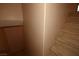Carpeted stairs provide access to the upper level of the home at 8842 Duncan Barrel Ave # 101, Las Vegas, NV 89178
