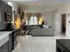 Open-concept kitchen and living room create a bright and inviting atmosphere at 9028 Cypress Point Way, Las Vegas, NV 89117
