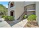 Well-maintained condo with landscaped grounds and stairs to the second-floor residences at 950 Seven Hills Dr # 114, Henderson, NV 89052