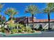 View of the Horizons Clubhouse with palm trees in front, promoting community amenities at 950 Seven Hills Dr # 114, Henderson, NV 89052