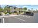 Apartment complex with assigned covered parking, mature trees, and meticulous landscaping at 950 Seven Hills Dr # 114, Henderson, NV 89052