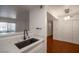 Contemporary kitchen features a breakfast bar, stainless steel appliances, and bright open floor plan at 950 Seven Hills Dr # 114, Henderson, NV 89052