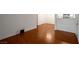 Modern living room features sleek, wood-look floors, freshly painted walls, and contemporary design at 950 Seven Hills Dr # 114, Henderson, NV 89052