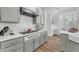 Well-equipped kitchen featuring a gas range, stainless steel appliances, and ample counter space at 9916 Netherton Dr, Las Vegas, NV 89134