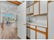Convenient kitchenette with sink and cabinetry near an open living area at 9916 Netherton Dr, Las Vegas, NV 89134