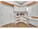 Bright kitchenette featuring custom cabinets and butcher block counters at 9916 Netherton Dr, Las Vegas, NV 89134
