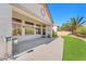Covered patio overlooking a green lawn and well-manicured landscaping at 9916 Netherton Dr, Las Vegas, NV 89134