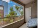 Enjoy relaxing on this private balcony with a comfortable chair and neighborhood views at 10001 Peace Way # 2231, Las Vegas, NV 89147