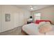 Bedroom featuring sliding closet doors, a comfortable bed, plush carpet, and a futon at 10001 Peace Way # 2231, Las Vegas, NV 89147