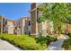Attractive building exterior with manicured landscaping and a sidewalk at 10001 Peace Way # 2231, Las Vegas, NV 89147