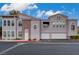 Charming condo complex featuring two-car garages and well maintained landscaping at 10001 Peace Way # 2231, Las Vegas, NV 89147