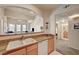 The kitchen features light wood cabinets and stainless steel appliances at 10001 Peace Way # 2231, Las Vegas, NV 89147