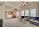 The open-concept space has high ceilings, a ceiling fan and lots of natural light at 10001 Peace Way # 2231, Las Vegas, NV 89147
