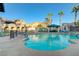 Sparkling community pool with ample seating and lush landscaping for a relaxing atmosphere at 10001 Peace Way # 2231, Las Vegas, NV 89147