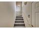 Carpeted stairway featuring railing for safe passage between floors and ample lighting at 10001 Peace Way # 2231, Las Vegas, NV 89147