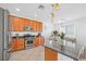 Kitchen featuring stainless steel appliances, granite countertops, and light wood cabinetry at 10617 Hartford Hills Ave, Las Vegas, NV 89166