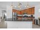 Kitchen featuring stainless steel appliances, granite countertops, and light wood cabinetry at 10617 Hartford Hills Ave, Las Vegas, NV 89166