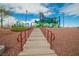A modern playground with accessible ramps and green turf, promotes active and inclusive play for children of all abilities at 10617 Hartford Hills Ave, Las Vegas, NV 89166