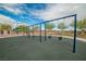 A community park features swings, play structures, and walking paths, offering recreational opportunities for residents at 10617 Hartford Hills Ave, Las Vegas, NV 89166