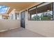 Balcony view with secure gate and stucco exterior with a view of the surrounding community at 1112 Observation Dr # 201, Las Vegas, NV 89128