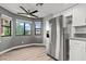 Bright kitchen with stainless steel refrigerator and views from the breakfast nook at 1112 Observation Dr # 201, Las Vegas, NV 89128