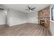 This living room has new flooring and a fireplace for a cozy atmosphere at 1112 Observation Dr # 201, Las Vegas, NV 89128