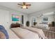 Spacious main bedroom with large closet doors, neutral decor, and an ensuite bathroom at 1112 Observation Dr # 201, Las Vegas, NV 89128