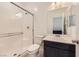 Bathroom features a shower with glass doors, toilet, and sink at 12546 Mosticone Way, Las Vegas, NV 89141