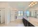 Bright bathroom featuring double sinks, shower, and tub at 12546 Mosticone Way, Las Vegas, NV 89141