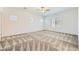 Large main bedroom features neutral carpet and ceiling fan at 12546 Mosticone Way, Las Vegas, NV 89141