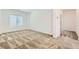 Spacious bedroom featuring neutral carpet, bright natural light, and offering a serene atmosphere at 12546 Mosticone Way, Las Vegas, NV 89141