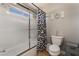 Bathroom featuring tiled shower and toilet at 1407 Fields St, Las Vegas, NV 89142